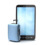 Travel bag and mobile phone on white background