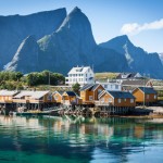 Typical Norwegian fishing village with traditional red rorbu hut